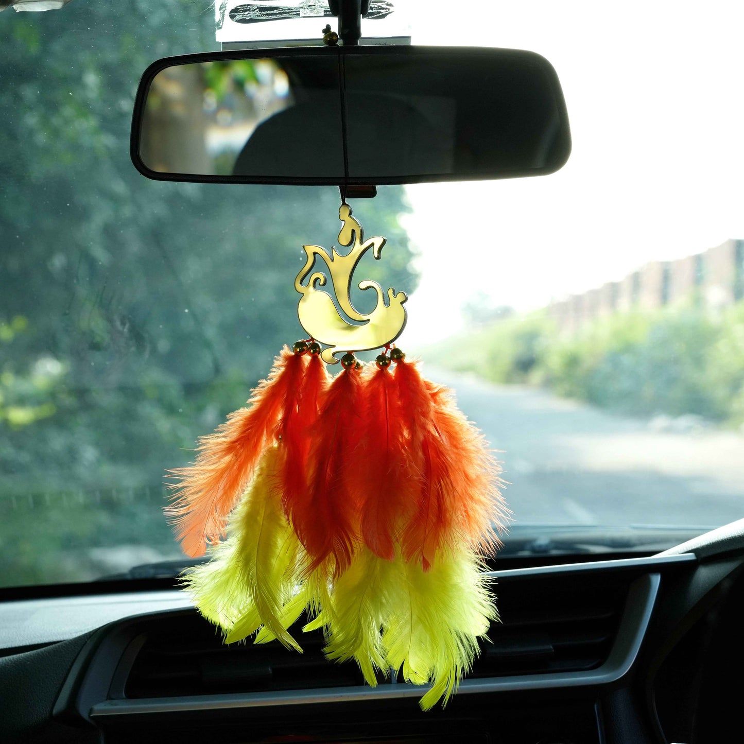 Lord Ganesha Car Dream Catcher with Golden Mirror Finish & Air Freshener (Yellow-Orange Feathers)